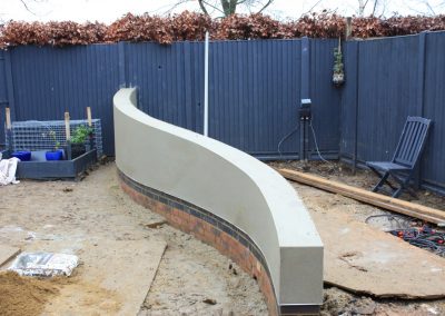 Curved garden wall being constructed in our clothall common garden project.