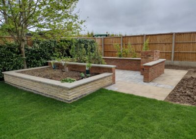 Bespoke brick planters ready for planting in our Upper Caldecote garden project.